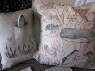 Coral and Tusk embroidered pillows